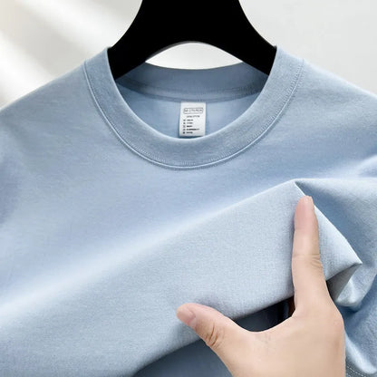 Men's drop shoulder t-shirt in thin cotton fabric, shown in a solid colour.