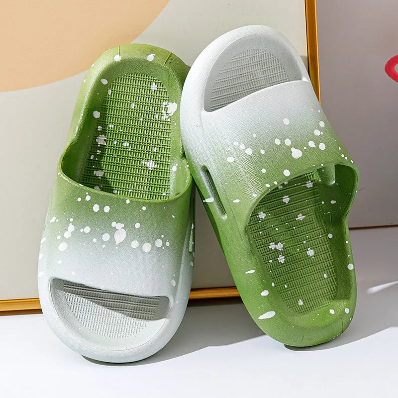 Gradient blue PVC slipper for children on a white background, showing non-slip sole.