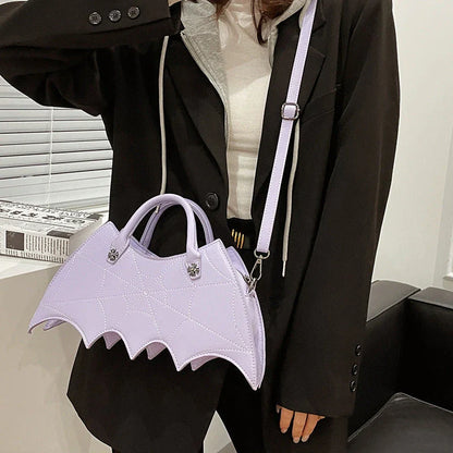 Stylish Halloween spider web crossbody bag in various colors, including black, white, brown, pink, and purple