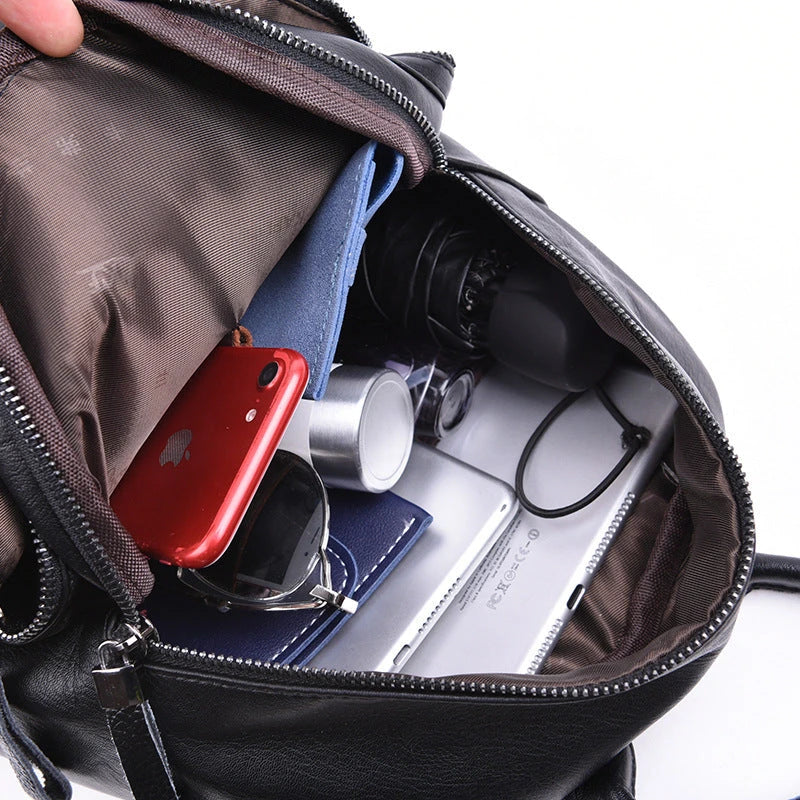 Stylish PU backpack with a sleek, vertical square shape and dual straps for comfortable, hands-free carrying