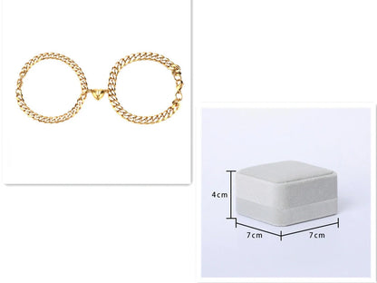 Fashionable titanium steel couple bracelets in gold and silvery colors, showcasing the minimalist and sleek design