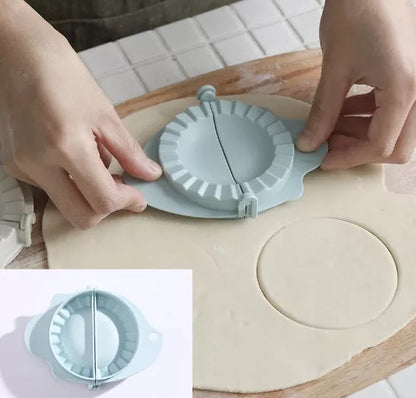 Plastic dumpling maker device in blue, green, and white for quick, uniform dumplings