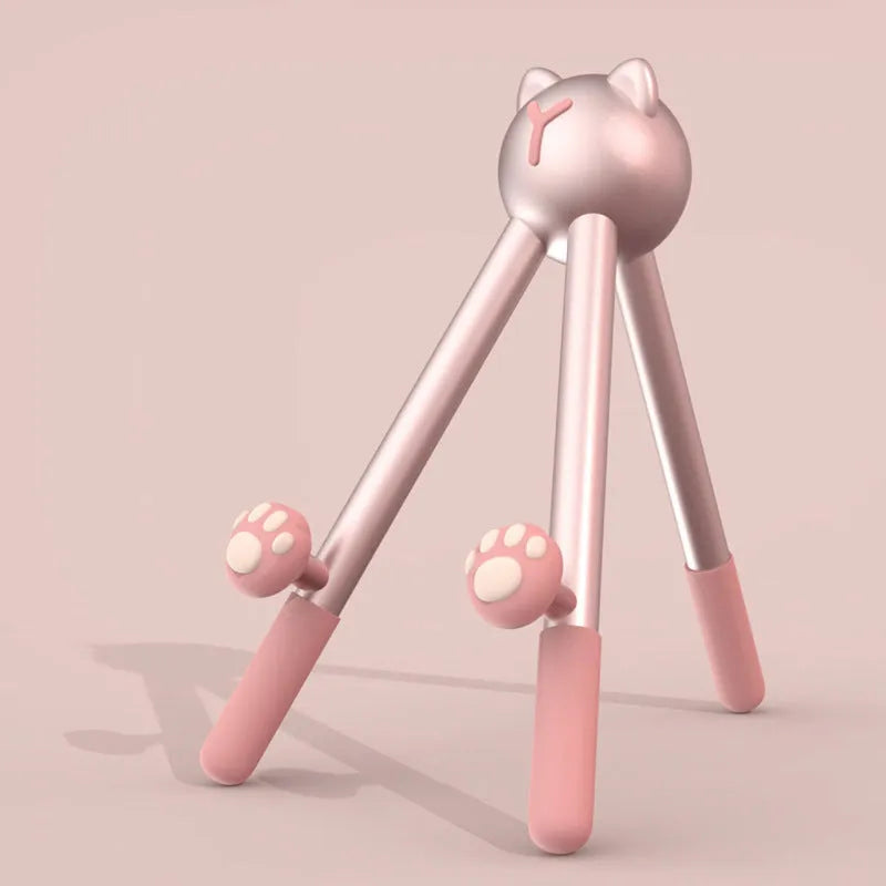 Aluminium alloy desktop phone and tablet stand with 120-degree adjustable angle, alien shape, green and pink options.