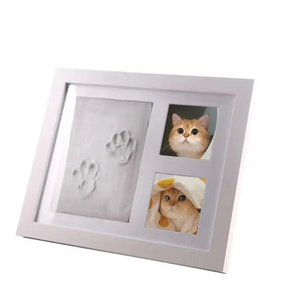 DIY pet paw print photo frame kit with moulding clay for dogs and cats, in black or white.