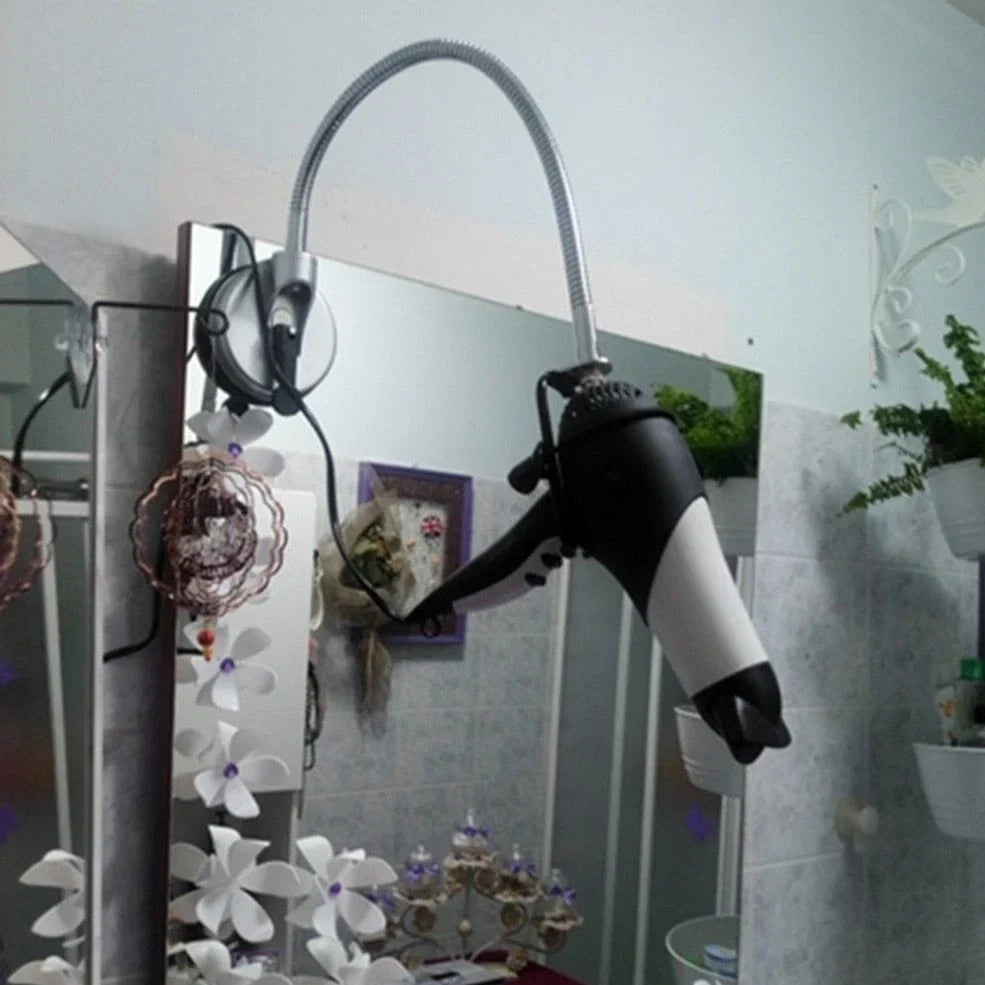 Stainless steel hair dryer holder with suction cup base showing 360-degree rotation capability