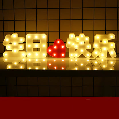 Plastic LED alphabet letter light spelling a message for a birthday or proposal.