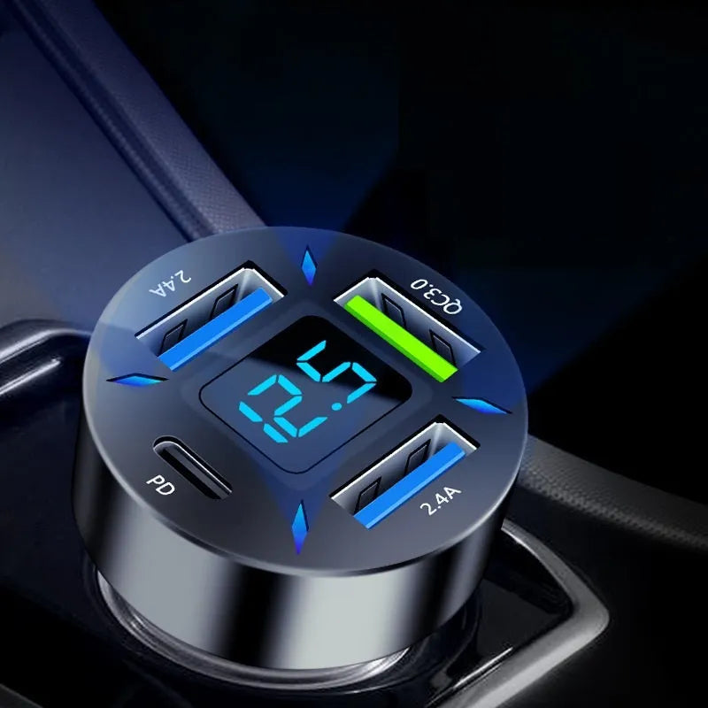 Four-port USB car charger with LED digital display showing voltage, compact black design for vehicle power socket