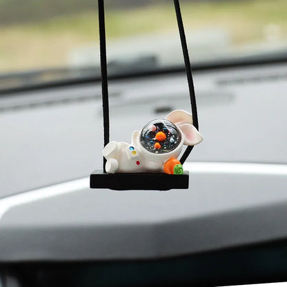 Colourful resin astronaut car pendant ornament with cartoon spaceman design on car dashboard