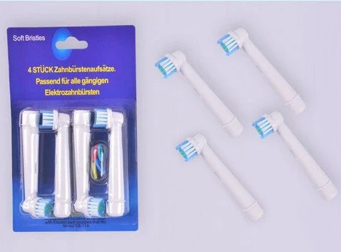 Premium electric toothbrush replacement heads in assorted colors, designed for universal fit with Oral-B and Braun electric toothbrushes.