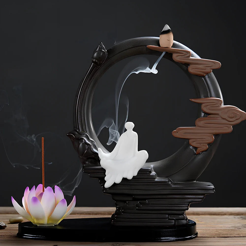 Purple sand tea pet backflow fragrance ornament with LED lighting creating cascading smoke effect