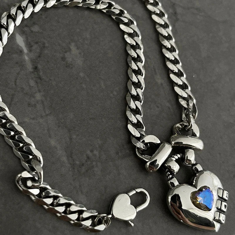 Heart Sweater Necklace with geometric design and Thai silver plated finish
