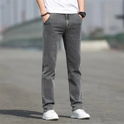 Smoky gray men's straight leg jeans with rabbit fur fabric on a hanger.