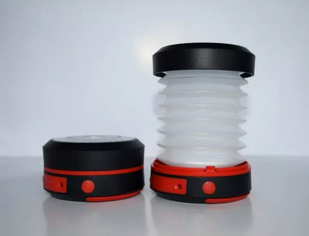 SolarBoom Collapsible Lantern with solar panel and USB charging port in green