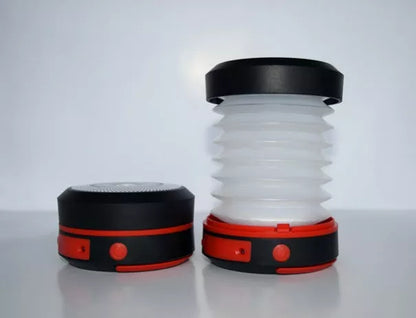 SolarBoom Collapsible Lantern with solar panel and USB charging port in green