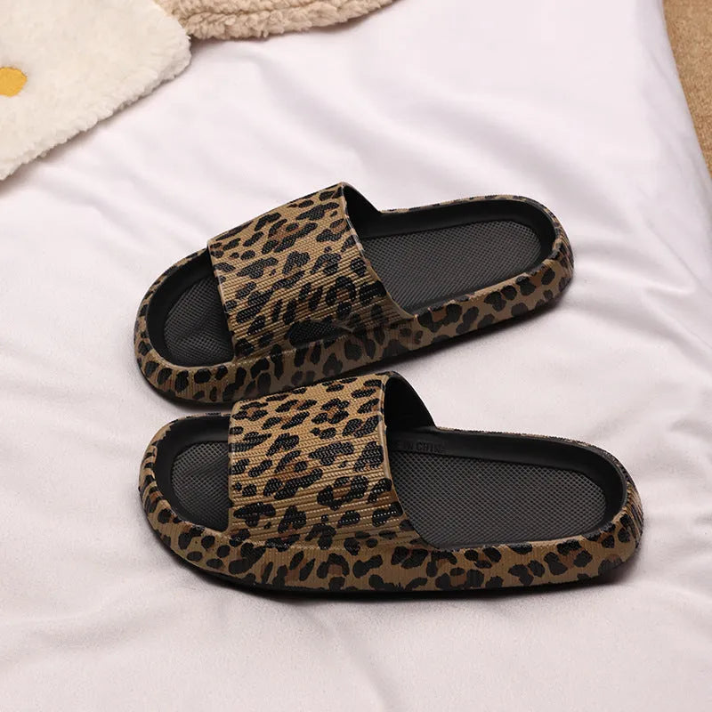Women's leopard print slippers with a thick EVA sole in multiple colour options on a white background.