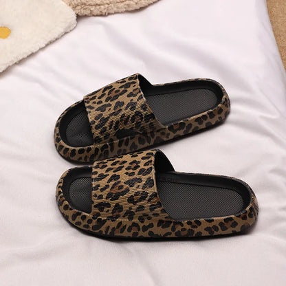 Women's leopard print slippers with a thick EVA sole in multiple colour options on a white background.