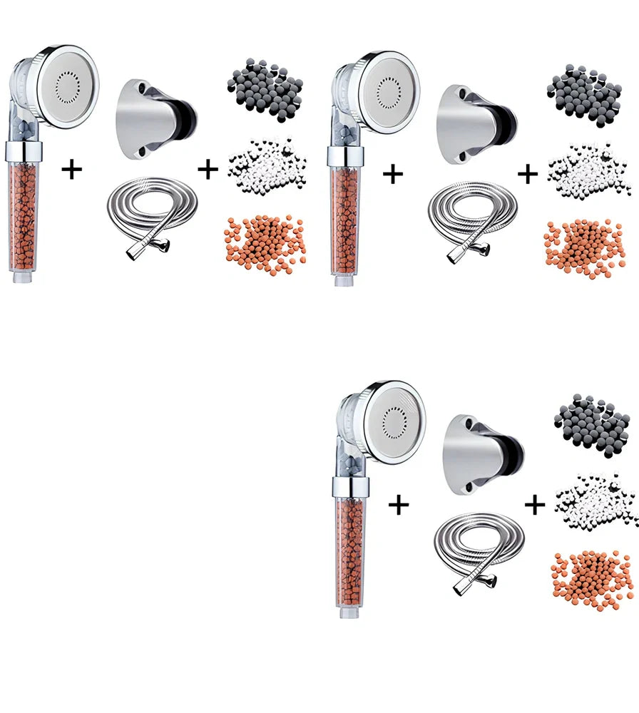 Pressurised shower head with stainless steel panel showing three water mode settings and removable nozzles