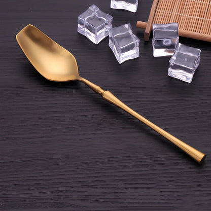 Four-piece stainless steel cutlery set showing main knife, fork, spoon, and teaspoon with mirror finish