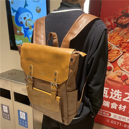 Unisex large capacity PU backpack in a solid colour, shown in college style.
