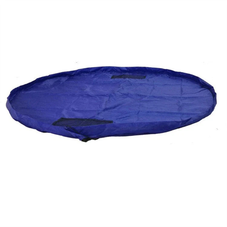 A large, waterproof travel picnic mat made of durable nylon with convenient toy storage bags for outdoor adventures.
