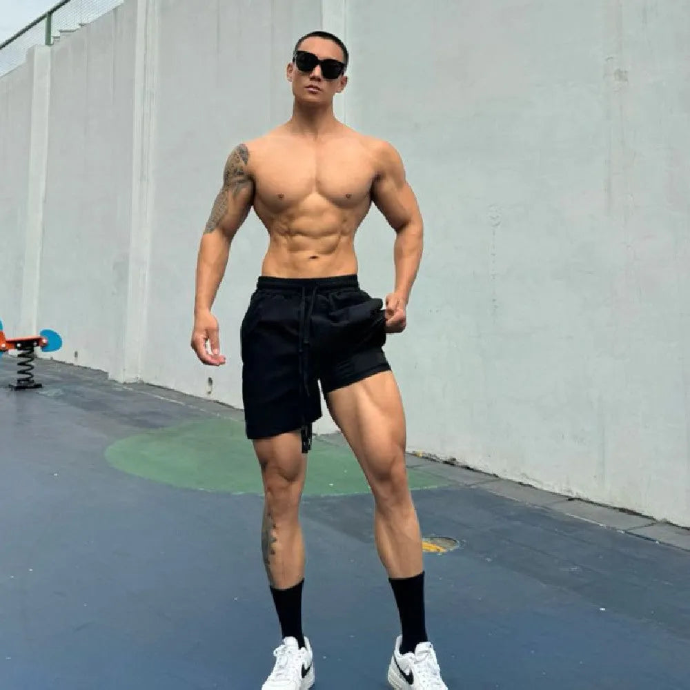 Men's ice silk quick-drying double-layer shorts in quarter-length design with nylon fabric