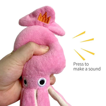 Pink squid-shaped corduroy plush dog toy with rope-like tentacles