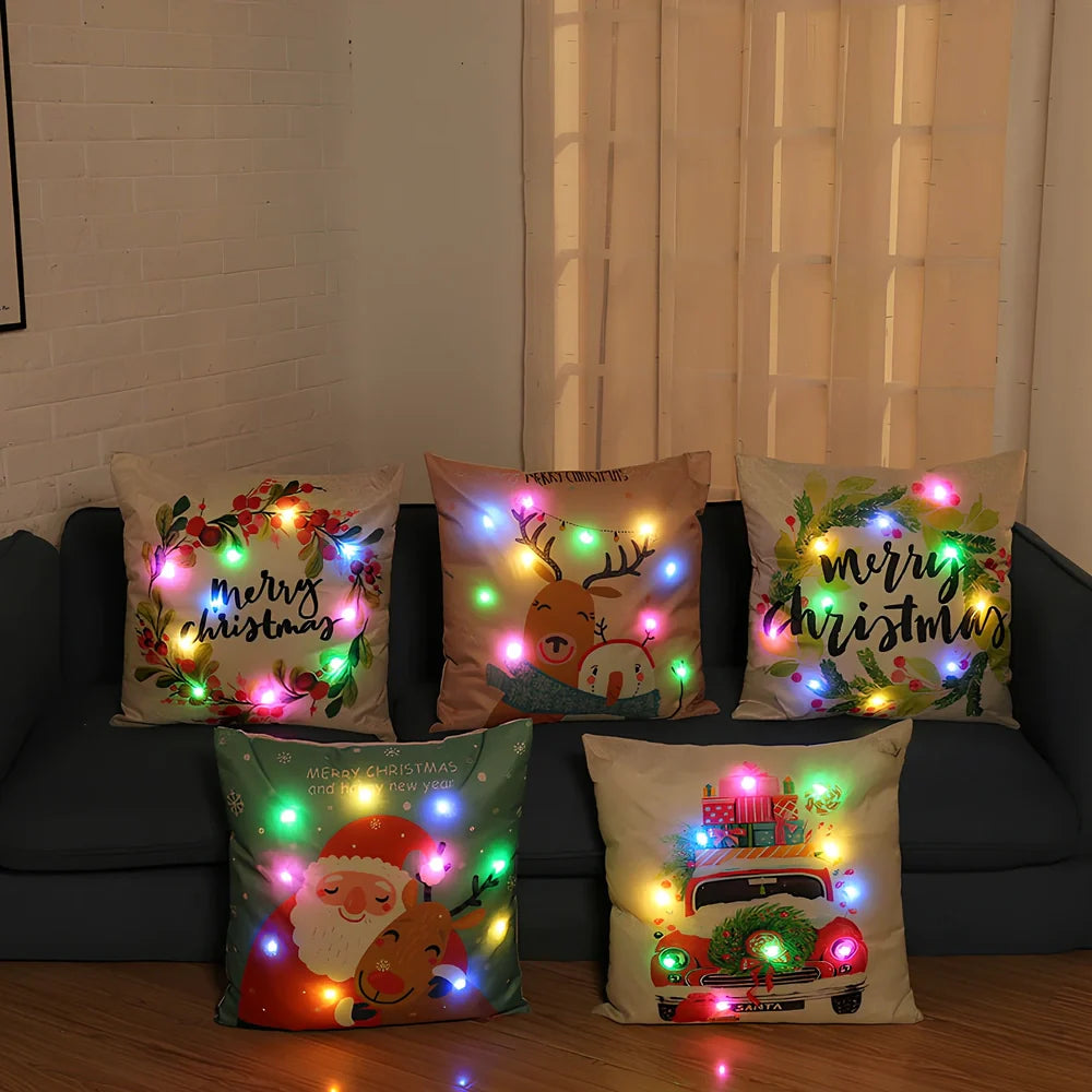 45cm square Christmas cushion with linen cover and battery-operated lighting showing festive design