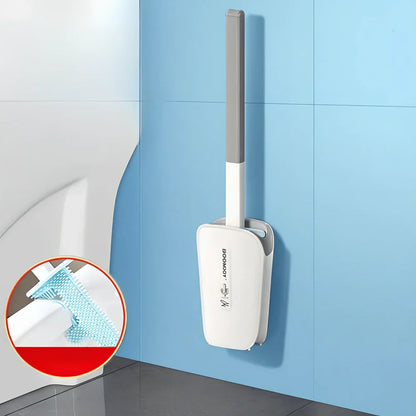 Blue toilet brush with angled TPR bristles in wall-mounted bucket for bathroom cleaning