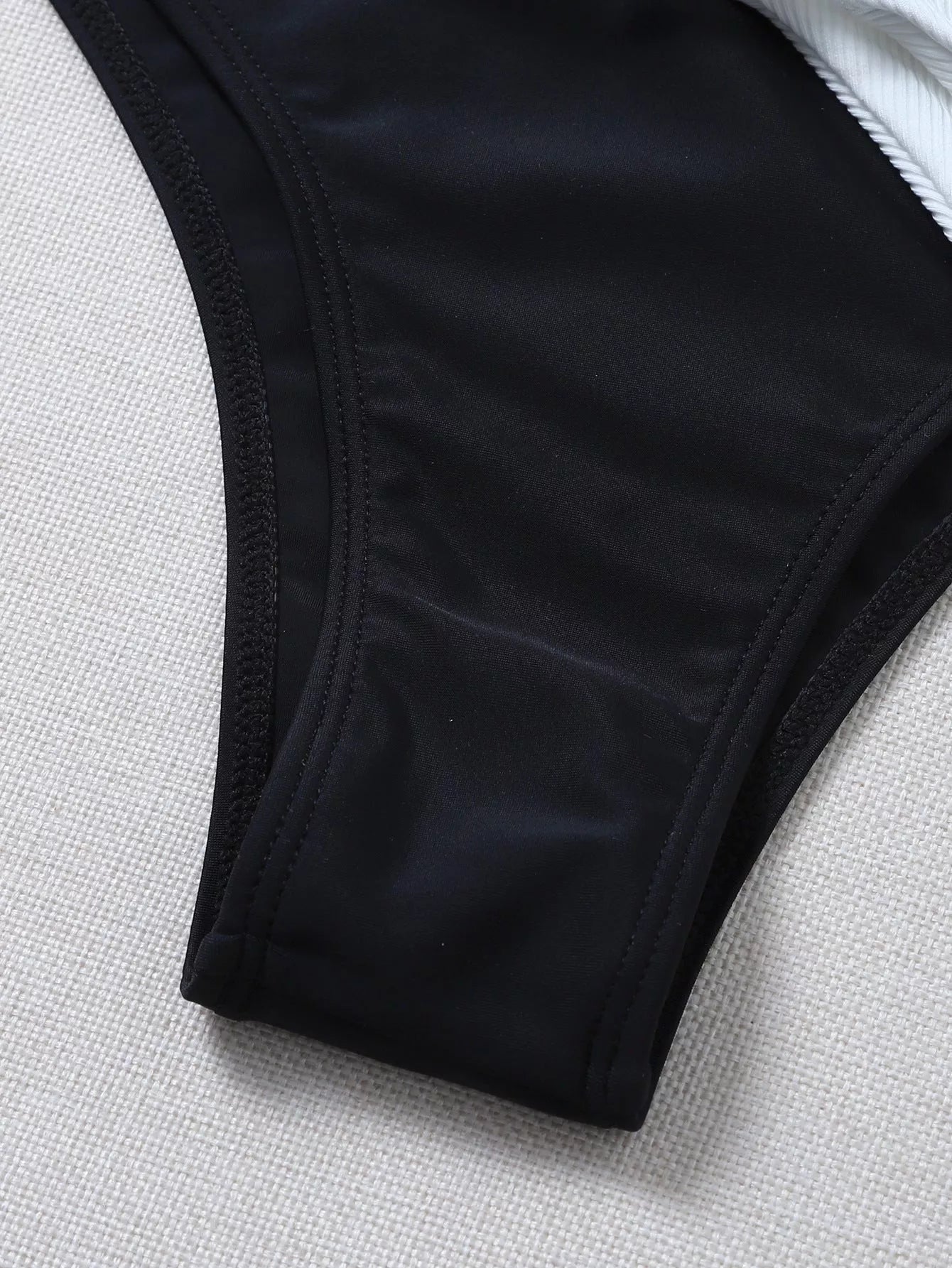 Solid color polyester bikini in black and white, fluorescent green, light blue