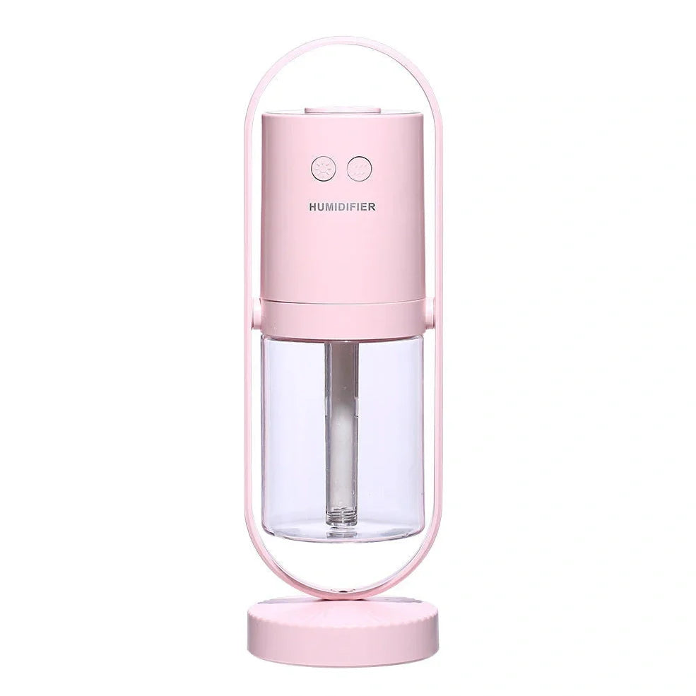 Portable USB humidifier with 200ml water tank in pink, blue, or white showing compact 70x66x213mm dimensions