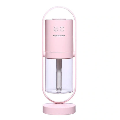 Portable USB humidifier with 200ml water tank in pink, blue, or white showing compact 70x66x213mm dimensions