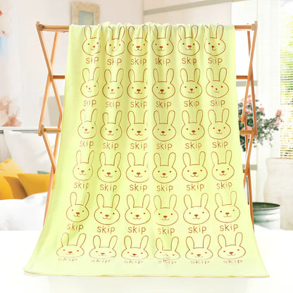 Microfiber bath towel with cartoon character print measuring 70cm wide by 140cm long