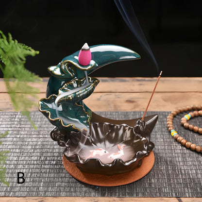 Monochrome glazed porcelain backflow incense burner with smoke waterfall effect and abstract Chinese design
