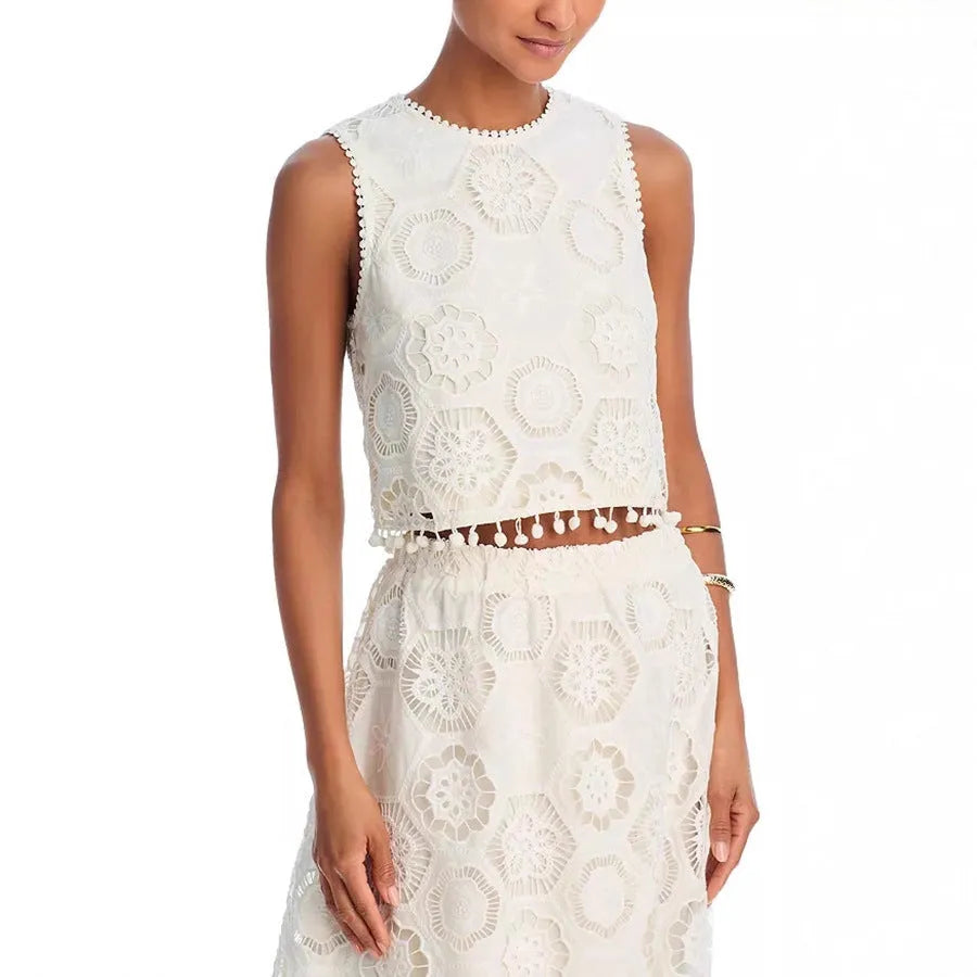 White women's sleeveless top and embroidered long skirt suit with retro art styling