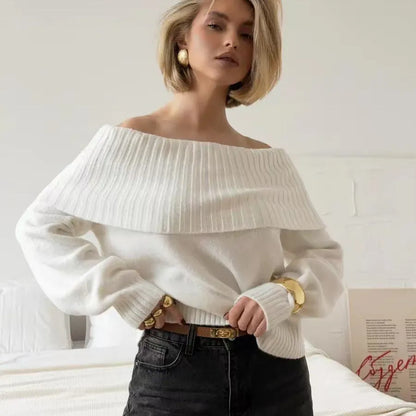 Grey off-shoulder acrylic sweater with 3D pattern texture, showing strapless design and regular sleeves