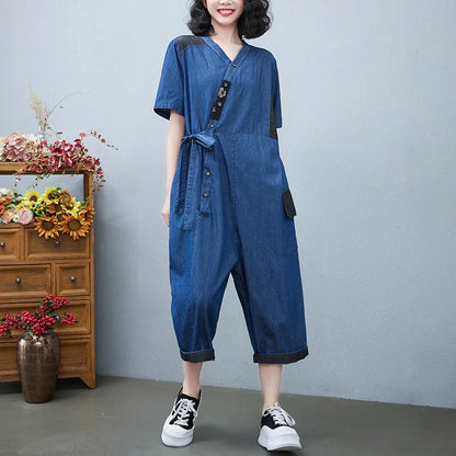 Stylish women's denim drawstring jumpsuit in blue and black