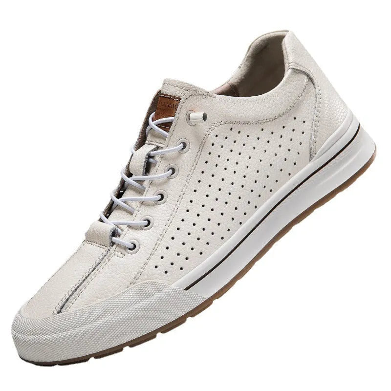 Men's white and black matte leather casual shoes with flat heel on a plain background, showing round toe shape.