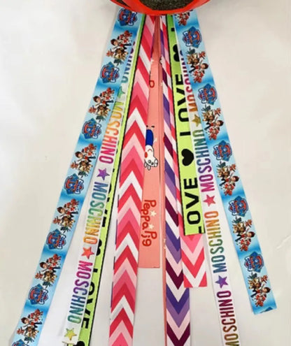 Children's helmet streamer with 60 cm polyester ribbon in colours like apricot and khaki for roller skating and skiing