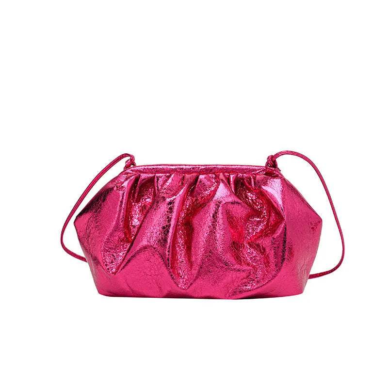 Simple hair clip closure crossbody bag in shell shape with sewing line detail on rose red PU material