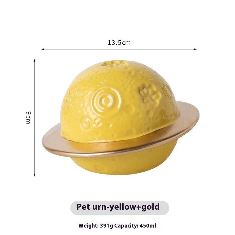 Handmade ceramic cinerary casket with cosmic starry sky design and cat-dog motifs in multiple colours