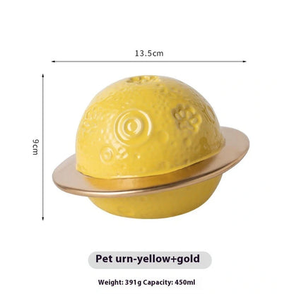 Handmade ceramic cinerary casket with cosmic starry sky design and cat-dog motifs in multiple colours