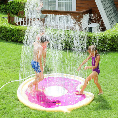 Children playing on a vibrant watermelon design water spray mat outdoors