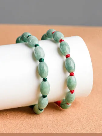 Jade national style bracelet with dark green men's and red women's versions including authenticity certificate