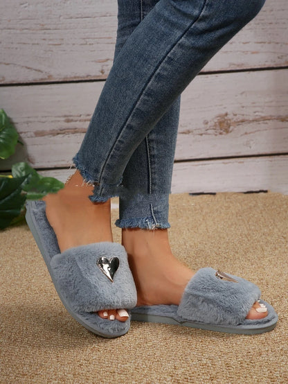 Cozy women's faux fur slippers with heart pendant in various colors
