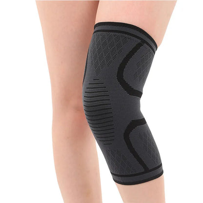 Black non-slip stretch sports knee pad shown on a knee, with size and colour options visible.