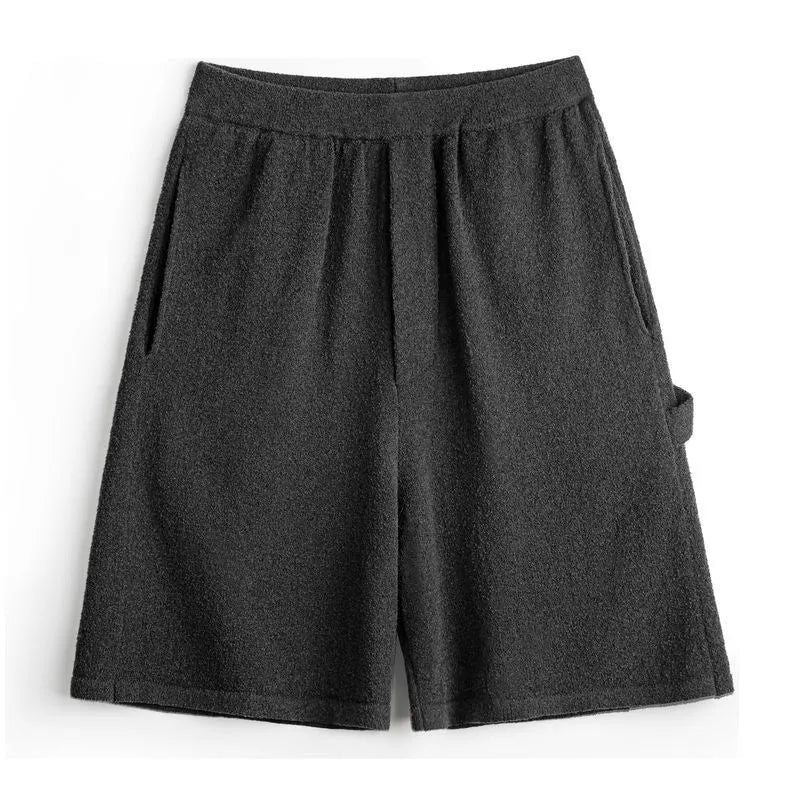 Cement grey men's straight-leg athletic shorts with a loose fit and elasticated waistband.
