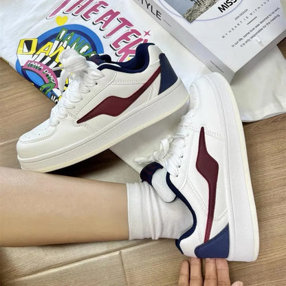 Women's low top board shoes in solid pink, white yellow, white black, or white red with mid heel and rubber sole