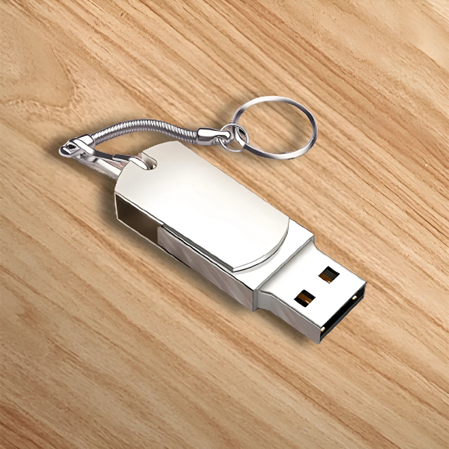 Small white metal USB flash drive with rotation mechanism showing USB connector