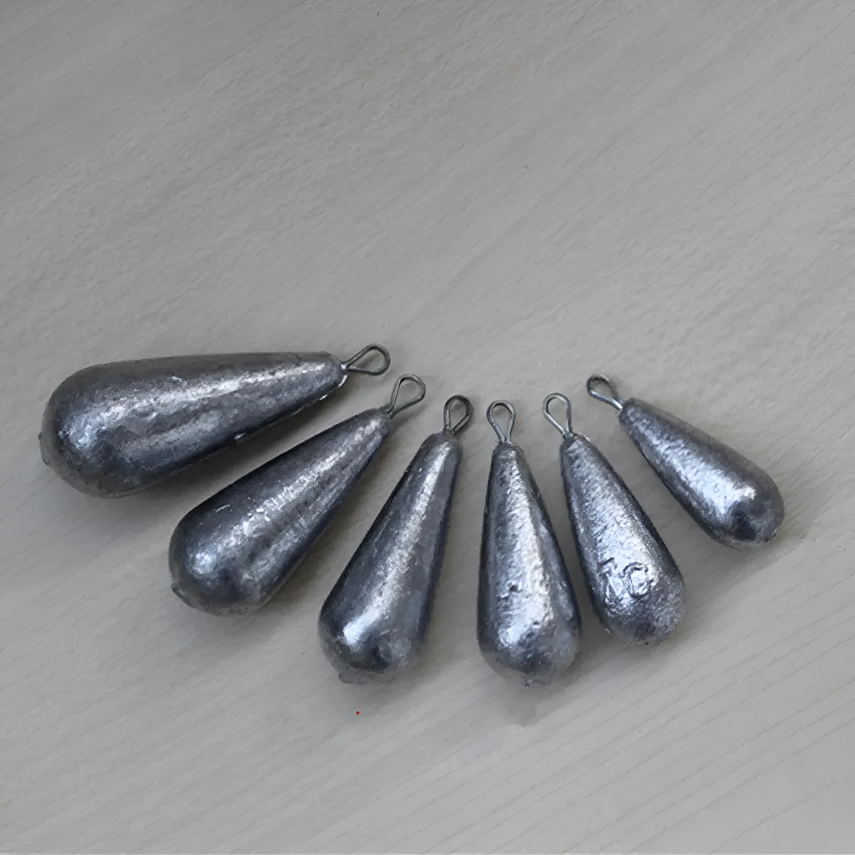 Drop shape band fishing sinkers in 20g, 30g, 40g, 50g weights with Tongxin settlement sinker