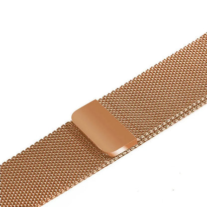 Stainless steel metal link strap for Apple Watch on a wrist, showing deployment clasp and polished finish